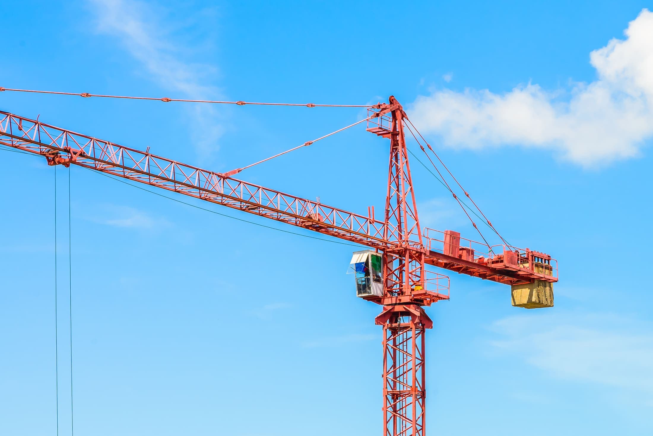 Construction crane and machinery on a building site